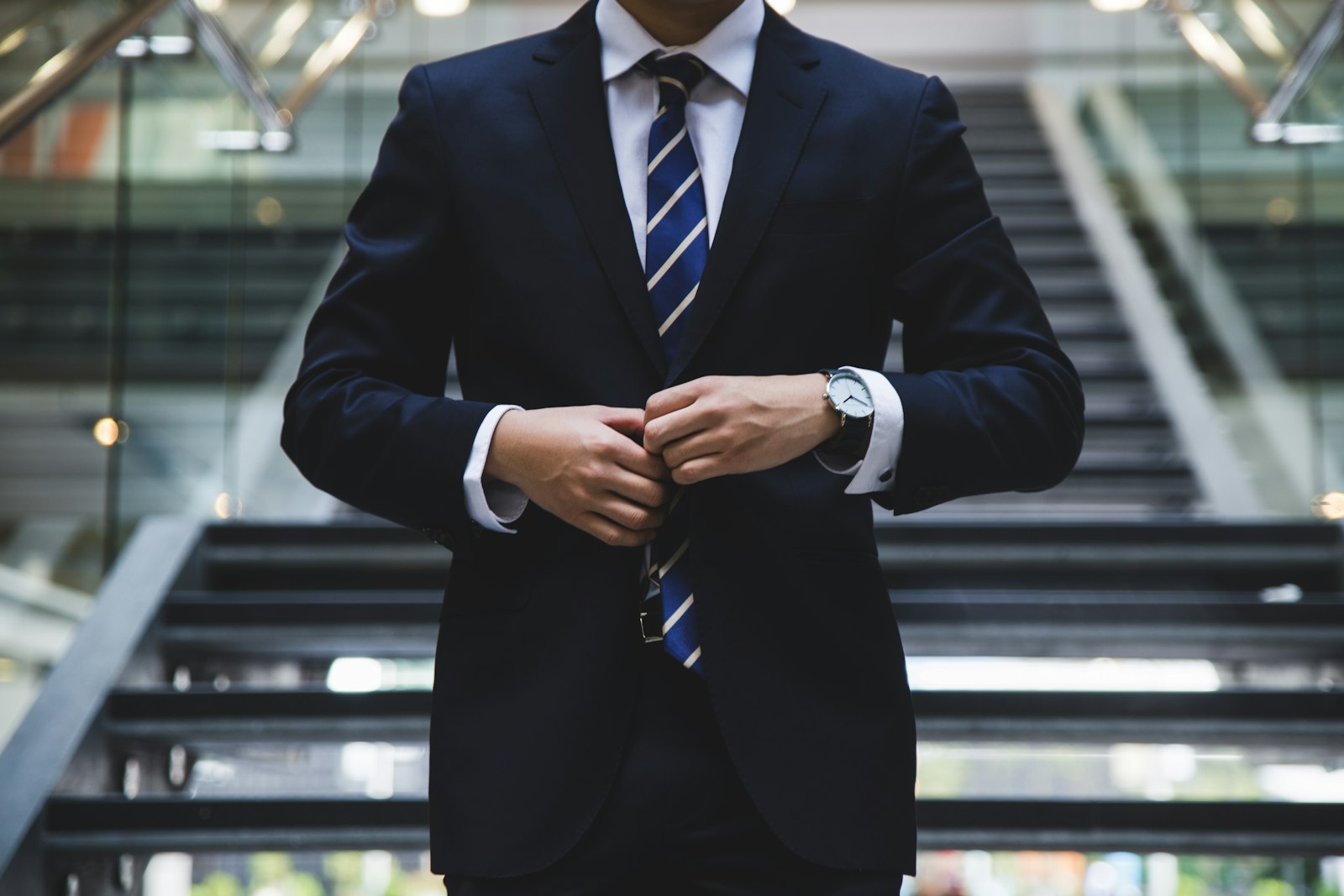 A cyber executive in a tailored suit, ready to present
